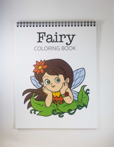 Cover of a coloring book with "Fairy Coloring Book" at the top and a cartoon image of a fairy